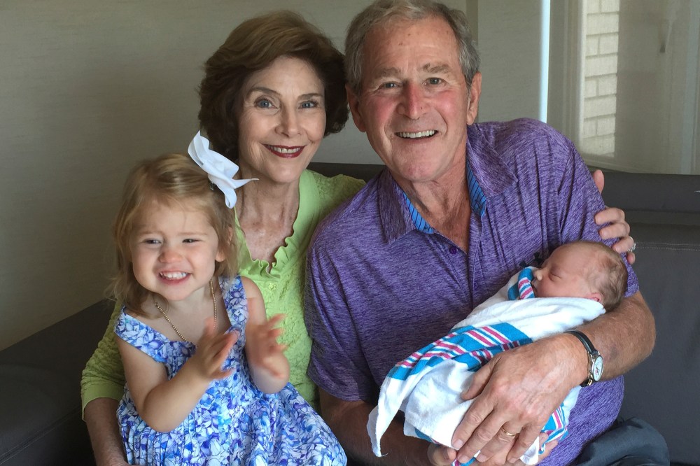 Former U.S. President George W. Bush and his wife Laura pose with their grand daughters Poppy Louise and Mila in New York. (Photo by Handout . / Reuters)