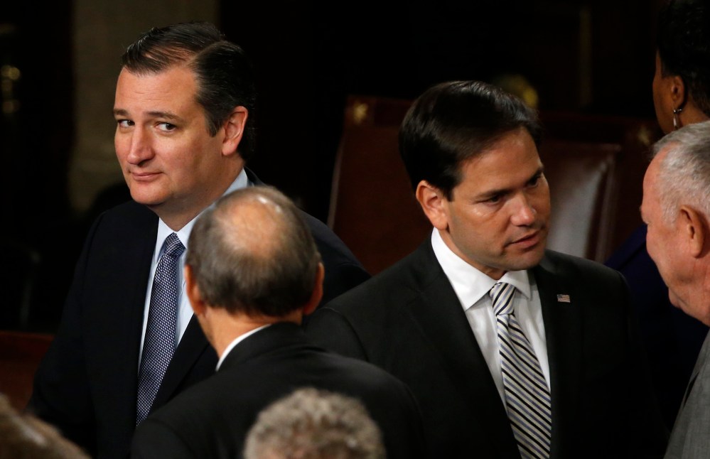 Presidential candidate Ted Cruz looks over at rival candidate Marco Rubio before a joint meeting of the U.S. Congress in the House of Representatives Chamber, Sept. 24, 2015. (Photo by James Lawler Duggan/Reuters)