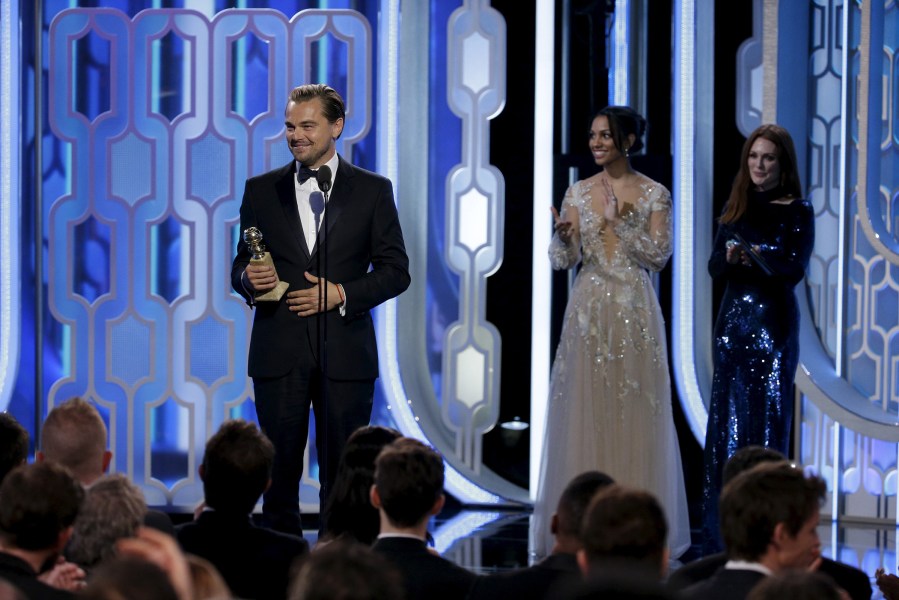 Leonardo DiCaprio holds his award for Best Actor, Motion Picture - Drama for 