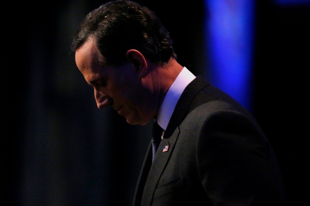 Republican presidential candidate and former Senator Rick Santorum stands offstage during a break of the debates held by Fox News in Des Moines, Iowa, Jan. 28, 2016. (Photo by Carlos Barria/Reuters)