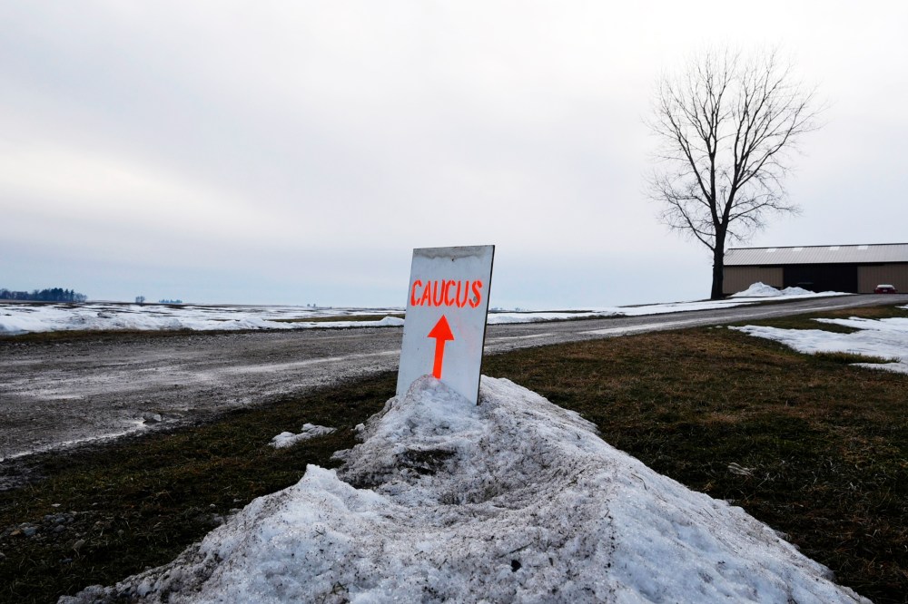 A sign directs caucus goers to the home of Gary and Mary Weaver in Rippey, Iowa, Feb. 1, 2016. (Photo by Nick Oxford/Reuters)