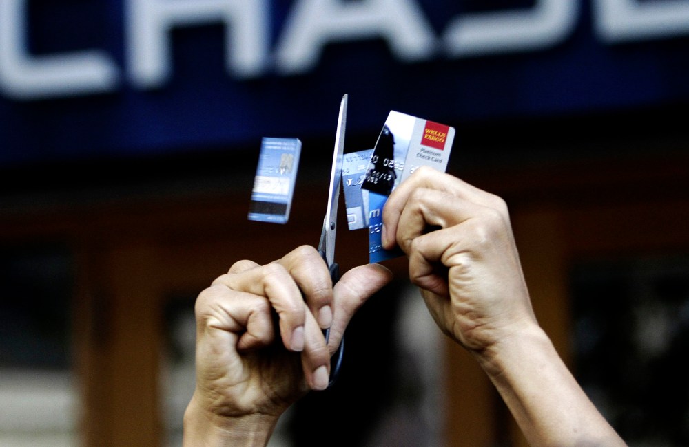 Occupy Seattle protesters cut up bank cards in from of a Chase bank in downtown Seattle, October 15, 2011.