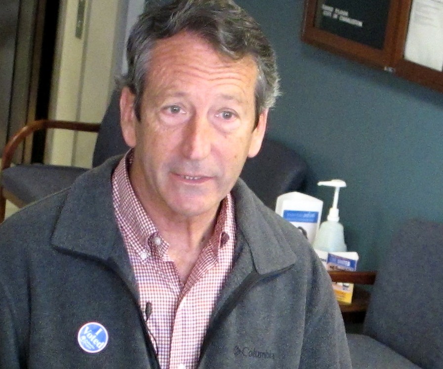 Former South Carolina Gov. Mark Sanford speaks with reporters on Tuesday, March 19, 2013, at a polling place in Charleston, S.C. Sanford, trying to make a political comeback, is one of 16 Republicans running Tuesday in the GOP primary in a special...