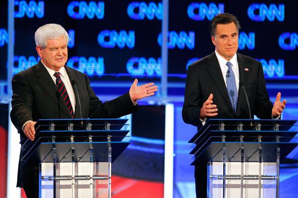 Frenemies Newt Gingrich and Mitt Romney facing off at Republican primary debate in Jacksonville, Florida on January 26, 2012.