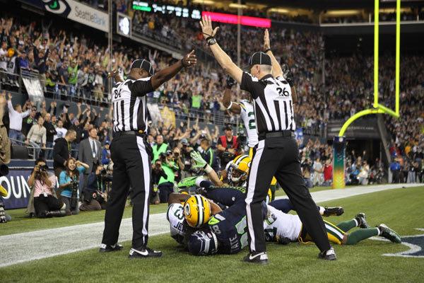 Confusion in the end zone during the Packers-Seahawks football game on Monday in Seattle, Washington.