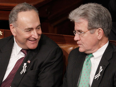 Sens. Charles Schumer and Tom Coburn during President Obama's 2011 State of the Union address in Washington, D.C. (File photo by Evan Vucci/AP)