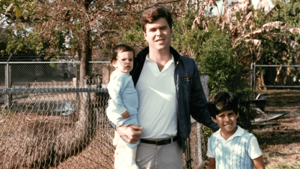 Jeb Bush poses with two of his children in a family photo from 1990, as shown in his latest campaign video, "Todos Somos Americanos" released on YouTube, Sept. 14, 2015.