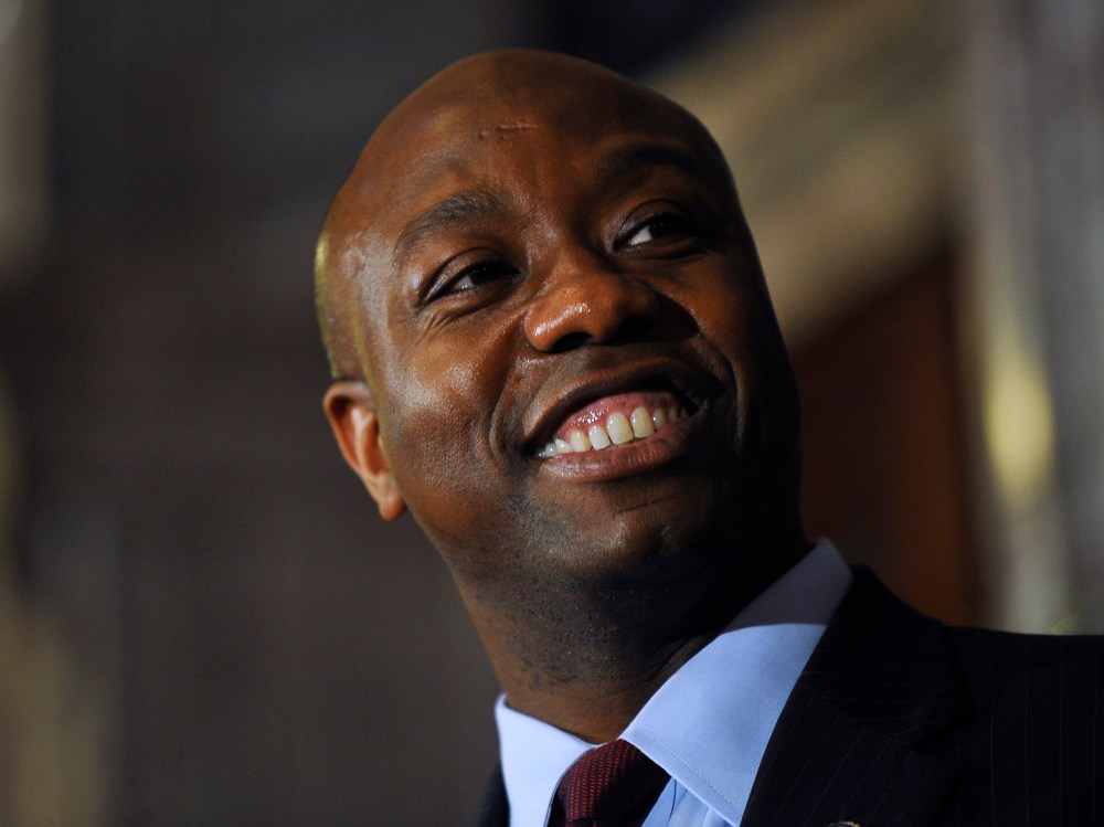 U.S. Rep. Tim Scott smiles during a press conference announcing him as Jim DeMint's replacement in the U.S. Senate at the South Carolina Statehouse on Monday, Dec. 17, 2012, in Columbia, S.C.  (Photo by Rainier Ehrhardt/AP Photo)