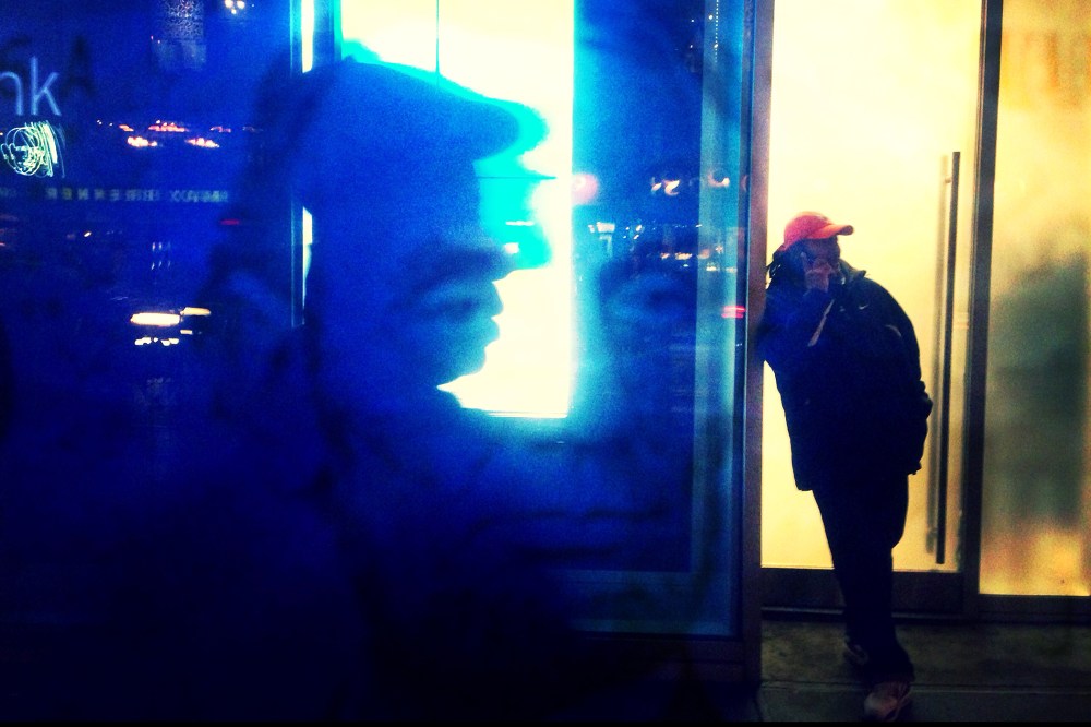 Man talks on his phone, New York, N.Y.