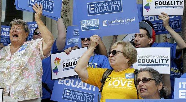 Marriage-equality proponents gather outside the Statehouse in Trenton, N.J.