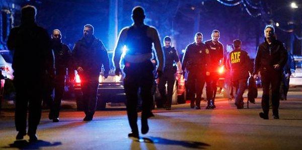 One Boston suspect killed, manhunt underway