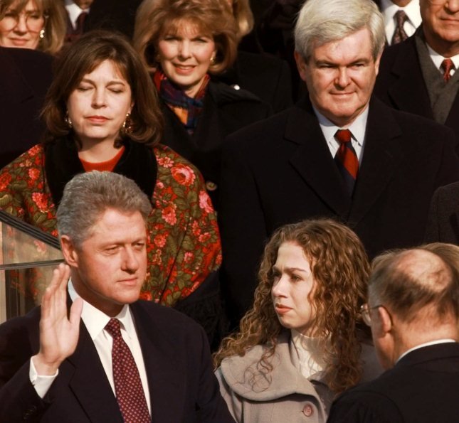President Clinton is sworn in for his second term by Supreme Court Chief Justice William Rehnquist during the 53rd Presidential Inauguration Monday, Jan. 20, 1997, in Washington. House Speaker Newt Gingrich and his second wife Marianne are in the...