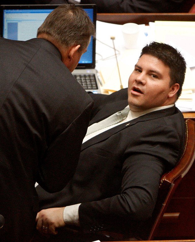 Oklahoma state Sen. Ralph Shortey, right, R-Oklahoma City, talks with a colleague on the floor of the Oklahoma Seante in Oklahoma City, March 16, 2011.