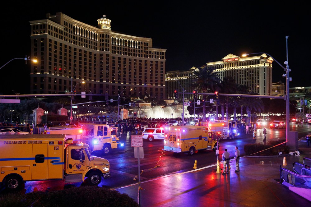 Police and emergency crews respond to the scene of a car accident along Las Vegas Boulevard, Dec. 20, 2015, in Las Vegas, Nev. (Photo by John Locher/AP)