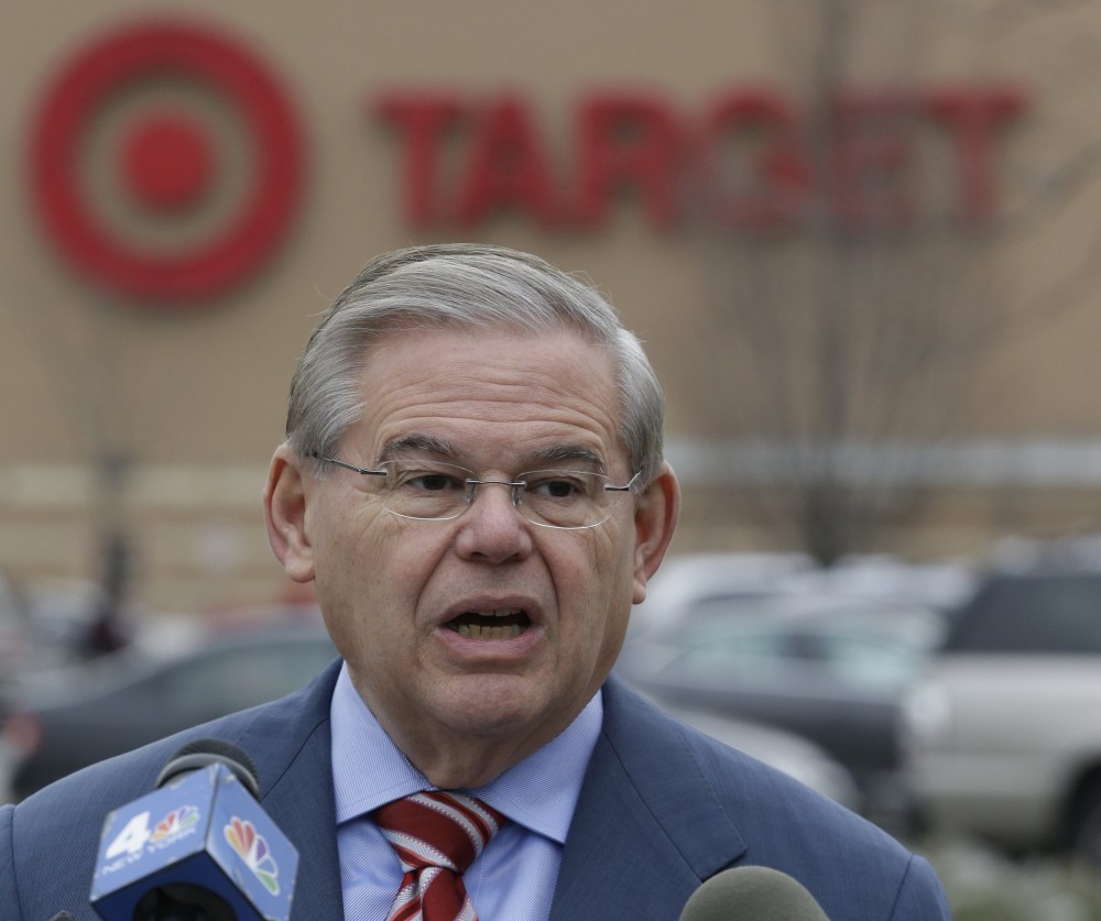 Sen. Robert Menendez talks during a news conference, December 26, 2013, in Jersey City, N.J.