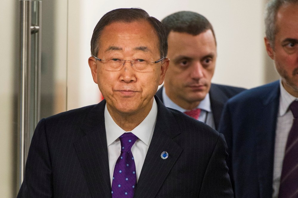 In this photo provided by the United Nations, United Nations Secretary-General Ban Ki-moon arrives for a press briefing wearing a purple tie in recognition of "Spirit Day" on Oct. 16, 2014 at the U.N. headquarters.