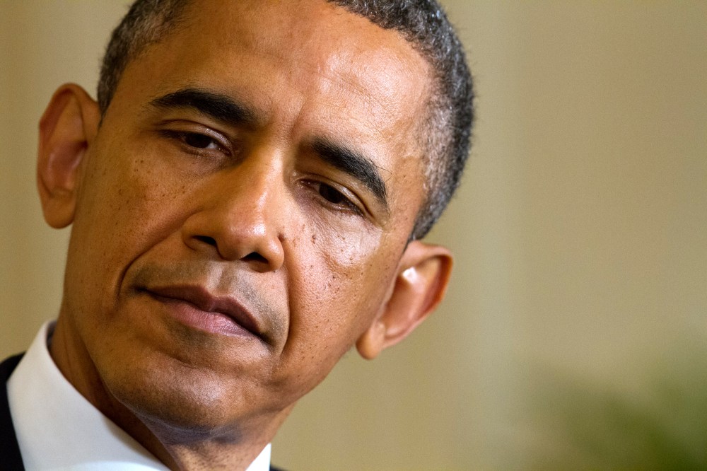 President Barack Obama listens as British Prime Minister David Cameron speaks, during their joint news conference, Monday, May 13, 2013, in the East Room of the White House. (AP Photo by Jacquelyn Martin/AP)