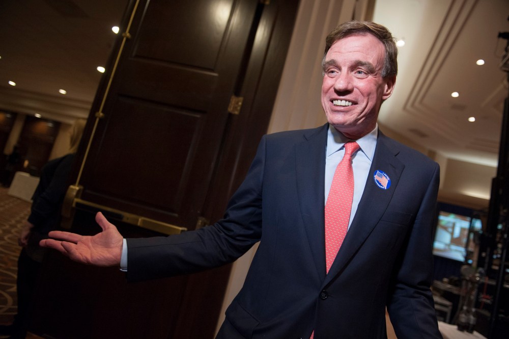 Sen. Mark Warner, D-Va., arrives at the Virginia Democratic "Victory for Virginia" election party, in Tysons Corner, Va., Tuesday, Nov. 5, 2013.
