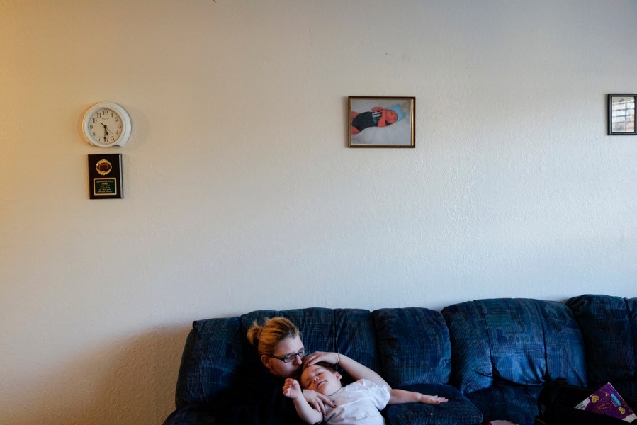 Autumn Sisco (19) and her son Bobby at home in Quinton. Okla.