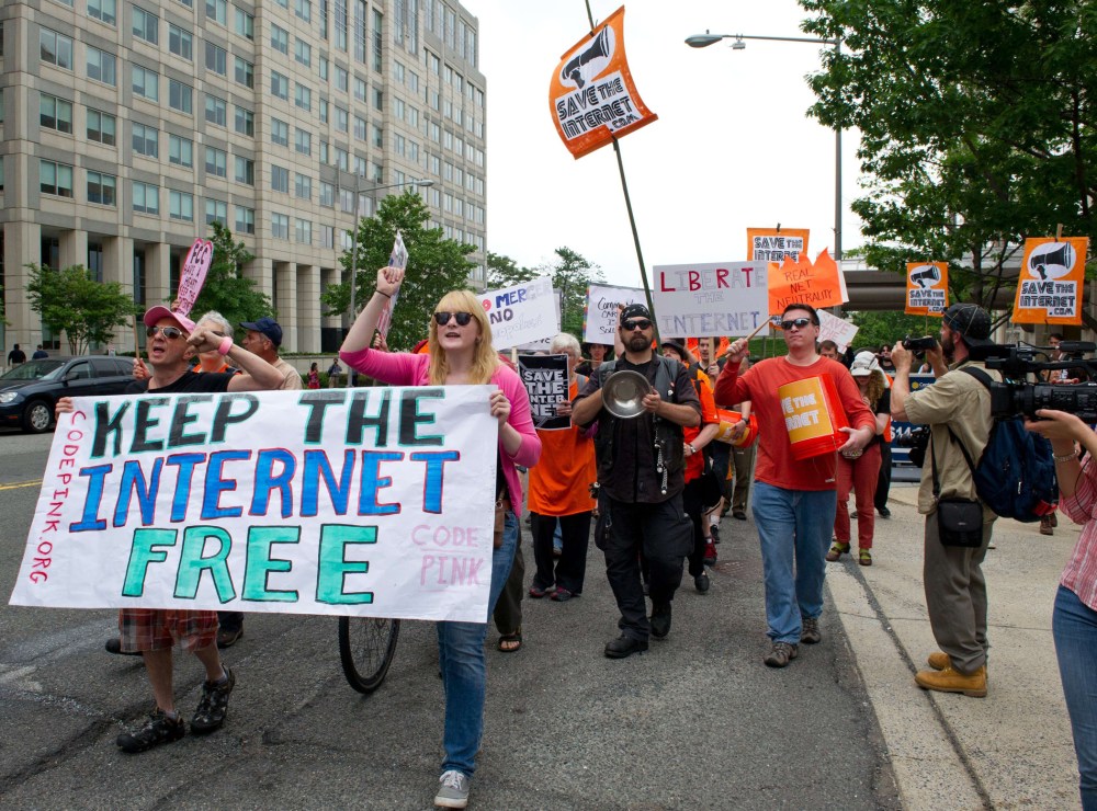 Protesters hold a rally to support "net neutrality" on May 15, 2014 at the FCC in Washington, D.C.