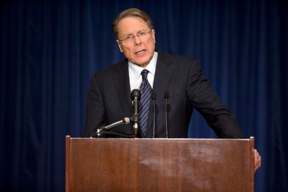 National Rifle Association Executive Vice President Wayne LaPierre calls on Congress to pass a law putting armed police officers in every school in America during a news conference Dec. 21, 2012 in Washington, DC.  (Photo by Evan Vucci/AP Photo)