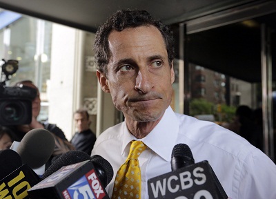New York City mayoral candidate Anthony Weiner leaves his apartment building in New York on Wednesday, July 24, 2013. (Photo by Richard Drew/AP)