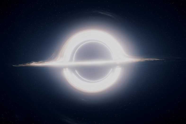 A frame from the Chris Nolan's "Interstellar," depicting a black hole.