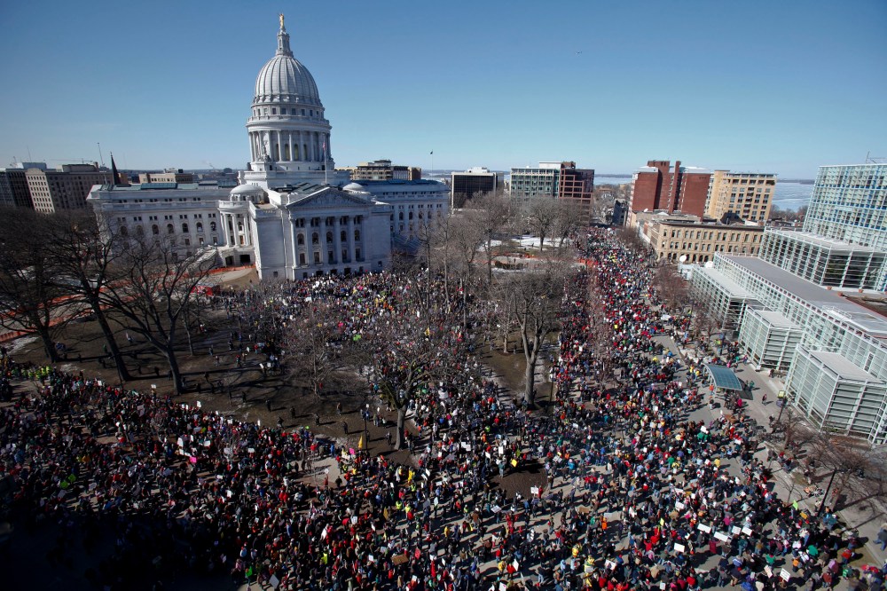 Protesters gather outside the state Capitol in Madison, Wis. on Saturday, Feb. 19, 2011.