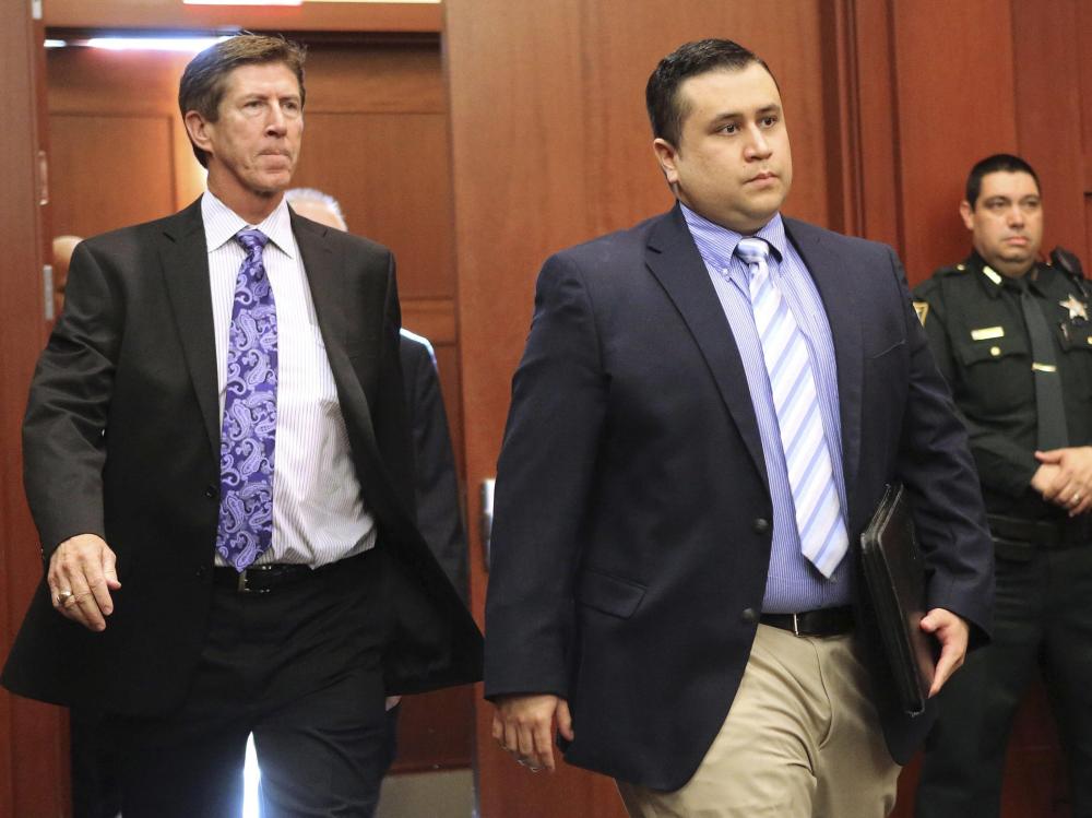George Zimmerman arrives with his lead counsel, Mark O'Mara (L) for a hearing in Seminole circuit court in Sanford, Florida in this file photo taken February 5, 2013. Photo by Joe Burbank/Pool/Reuters