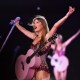 Taylor Swift performs on stage
