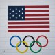 USOC logo showing a U.S. flag and the Olympic ring.