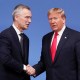 Jens Stoltenberg and Donald Trump shake hands