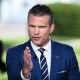 Pete Hegseth gestures during a television interview