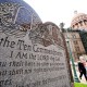 A granite Ten Commandments monument stands on the ground of the Texas Capitol