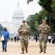 Members of the National Guard patrol near the Capitol
