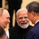 Indian Prime Minister Narendra Modi, center, talks with Russian President Vladimir Putin, left, and Chinese President Xi jinping