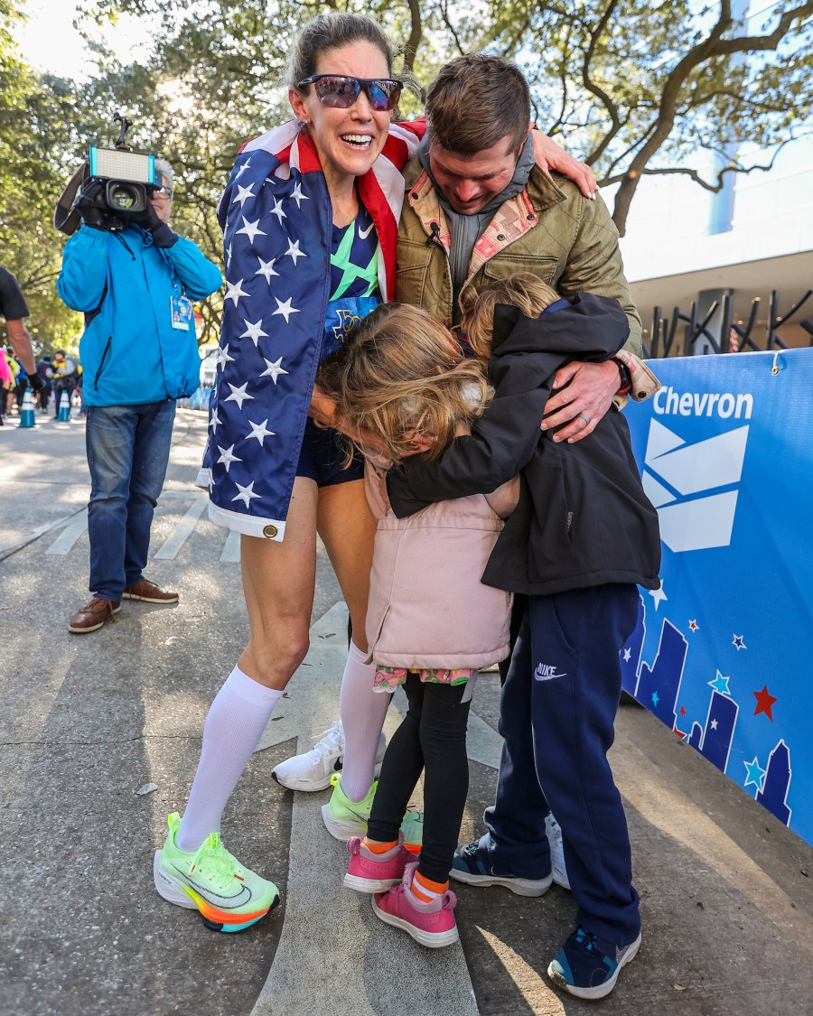 Keira D'Amato and her family after winning the marathon.
