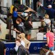 Travelers at a security checkpoint at