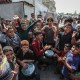 Palestinians celebrate ceasefire announcement in Gaza.