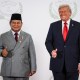 Donald Trump greets Prabowo Subianto.