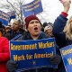 Members of the American Federation of Government Employees (AFGE) union protest.