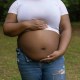 A pregnant Black woman.