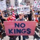Demonstrators take part in a "No Kings" national rally in Los Angeles, CA.
