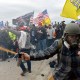 Trump supporters clash with police and security forces on Jan. 6, 2021 as people try to storm the US Capitol Building.