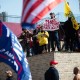 Demonstrators hold signs at a pro-Trump protest during the 2020 Presidential election in Detroit.