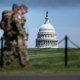 Members of the National Guard patrol the National Mall.
