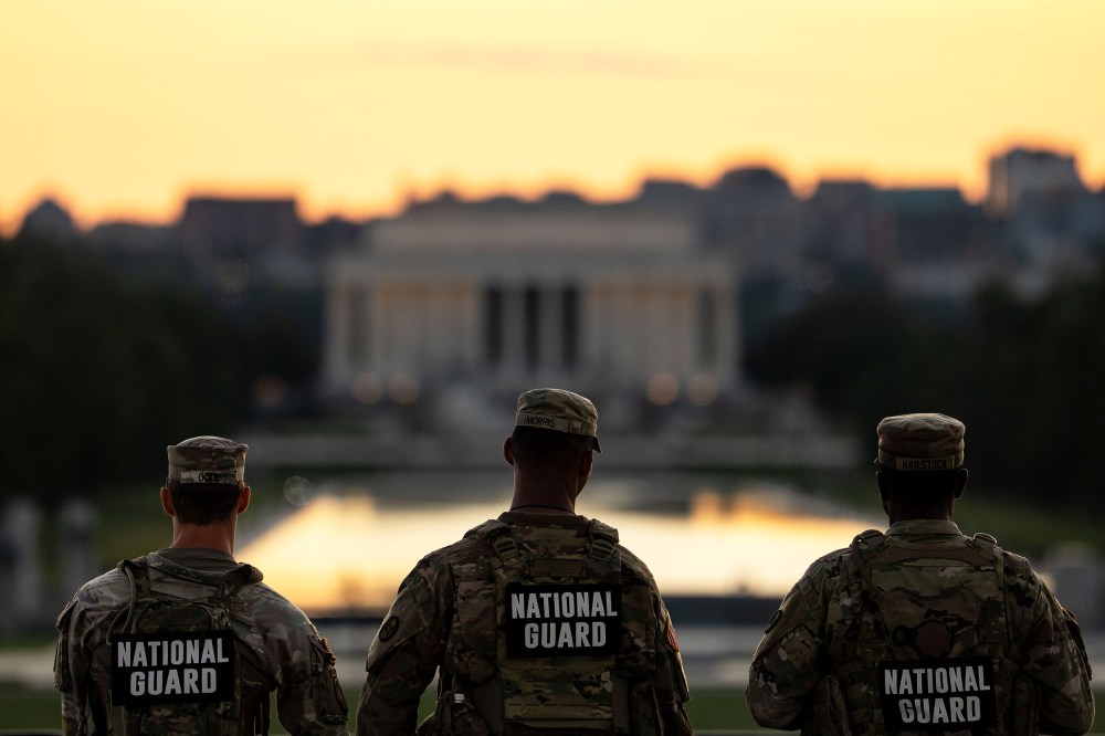 Members of the National Guard near the Washington Monument.