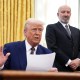 U.S. President Donald Trump and Secretary of Commerce Howard Lutnick in the Oval Office at the White House.
