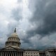 Storm clouds hover over the U.S. Capitol.