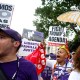 Demonstrators participate in the Justice Journey March in New Orleans to call for an end to the Trump administration’s ICE raids and the release of immigrant workers detained in Louisiana and across the United States.